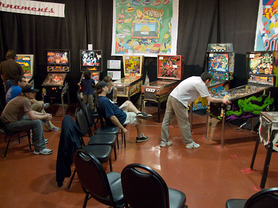 Andrei steps up to play his last machine in the final