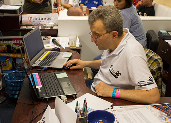 Marcin entering scores on one of the two laptops