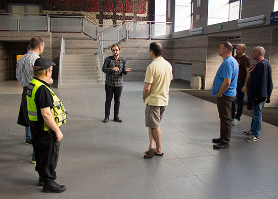 Our tour guide tells us about the renovation of the city's station