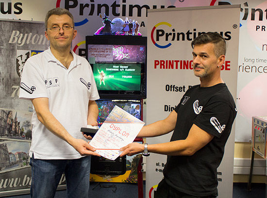 Fourth place, Hubery Krysinski, accepted by his father Marcin