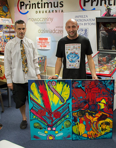 Daniele with both of Lucjan Nowinski's paintings