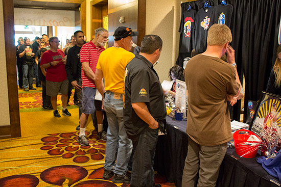 The queue at the registration desk at opening time