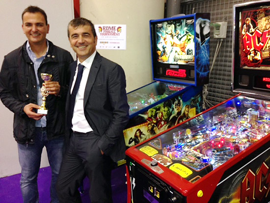 Giacomo Sorcecchi receives his trophy from Mauro Zaccaria of Tecnoplay