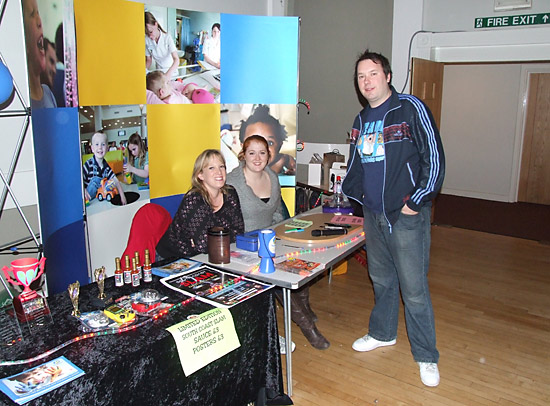 At the entrance desk, organiser Will Barber with his wife Jess and Jacqui