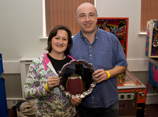 Kate Morris presents the trophy to first-placed Albert Medaillon