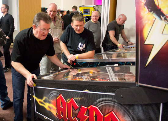 David Dutton watches Steve Ritchie play in their AC/DC final