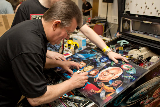 Steve signs the translite