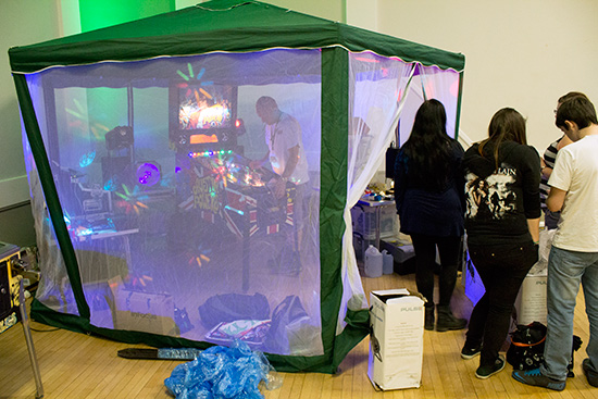 Lights, lasers, speakers, amps and smoke machines pour into the Psych Out tent