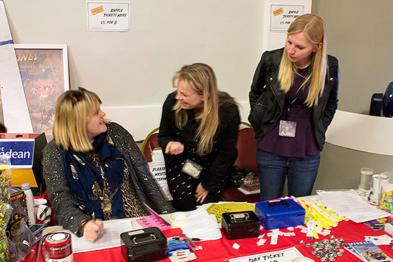 The ladies at the desk sorted everyone out with wristbands and raffle tickets
