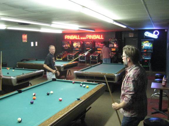 A game of pool during pinball practice