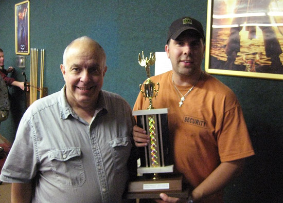 John was unbeatable; earning him a huge trophy