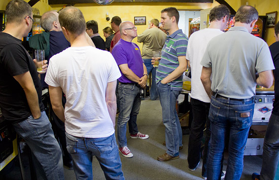 Gary Flower and Lee Fensom talk while everyone else plays
