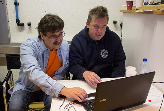 Robert Sutter and Daniel Harzenmoser check the results