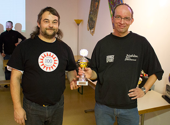 Third place, Albert Nomden receives his trophy from PinballEd himself, Edy Flammer