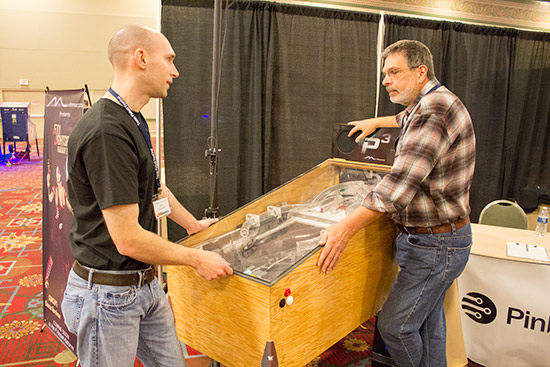 Geryy and Dennis discuss the design of Dennis's game