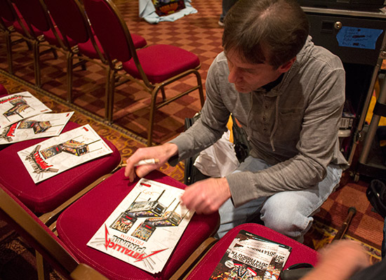 John Borg signs Metallica flyers