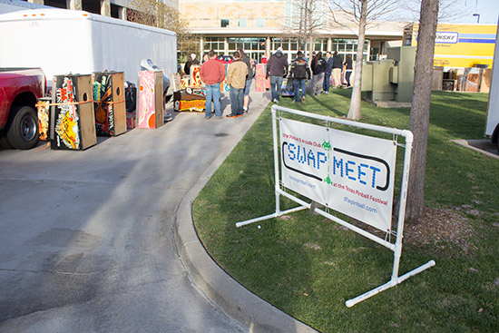 The swap meet in the hotel's parking lot