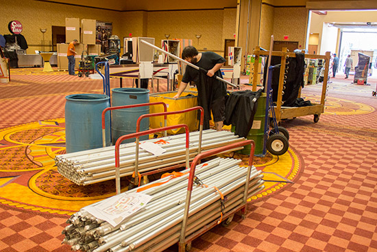 Curtain frames are built to help divide up the hall