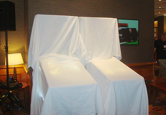 The two whitewood machines under wraps