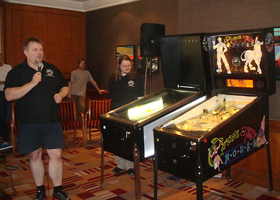 Illuminated cabinet side panels allow for interchangeable artwork