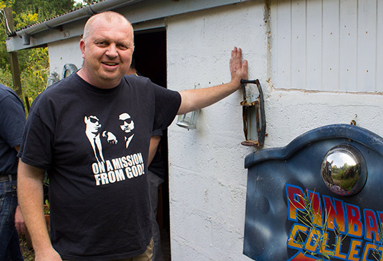 Dave Rolfe outside his pinball room