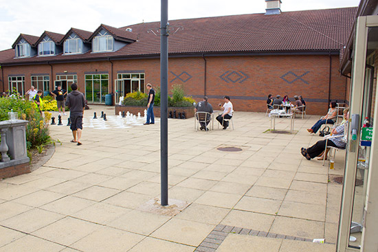 The patio area with an outdoor chess set
