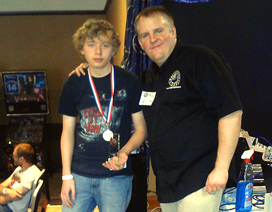 Third place, Elliot Miles