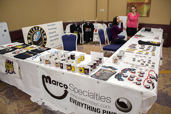 Heighway Pinball and UK Pinball Party merchandise at the front desk