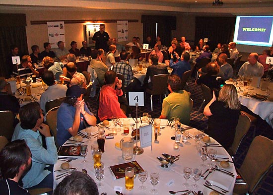 Nick Bennett welcomes guests to the dinner