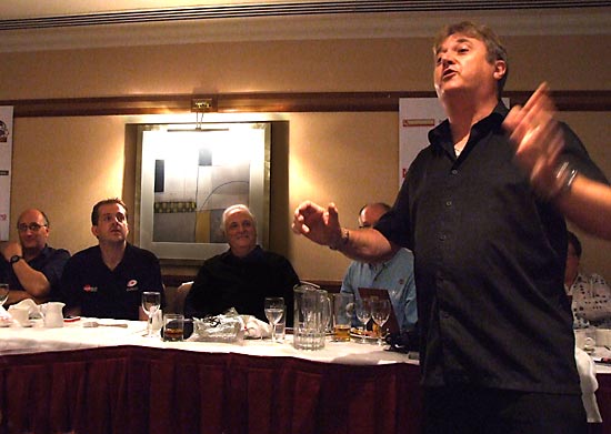 Mark Squires gets the dinner guests to sing along