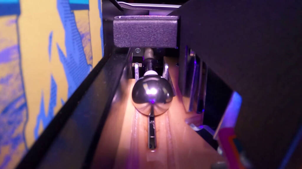 The game includes an autoplunger as well as the illuminated shooter rod housing