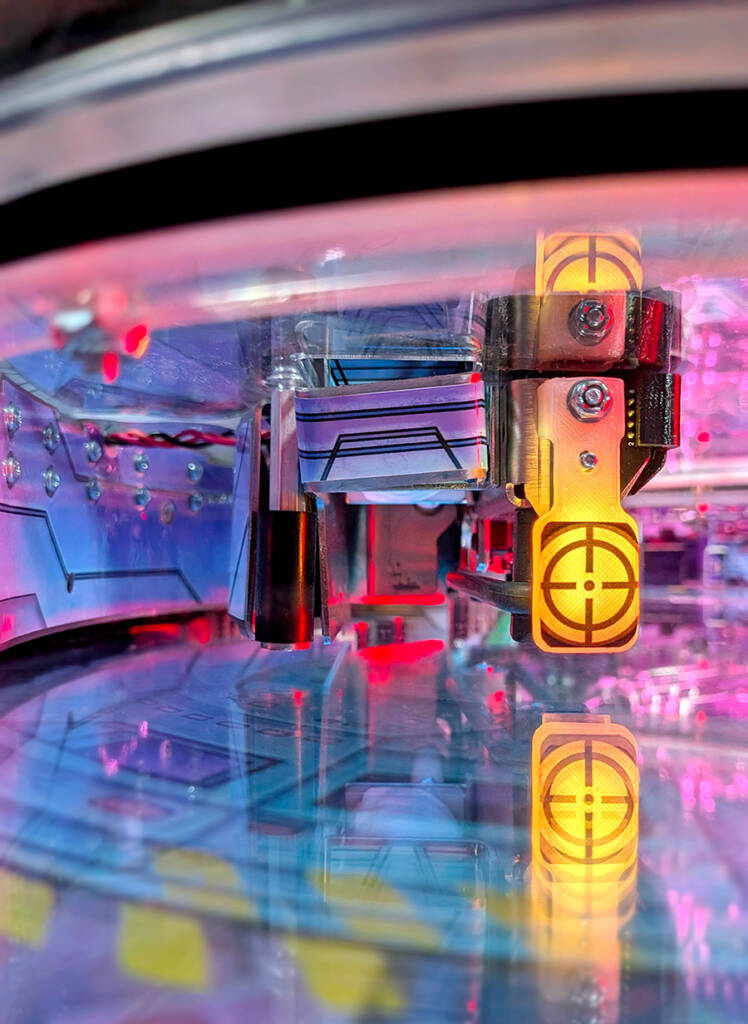 The cannon on the underside of the disk
