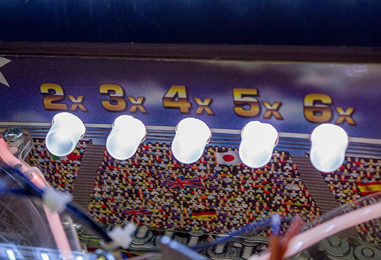 The playfield multiplier is shown on the back panel