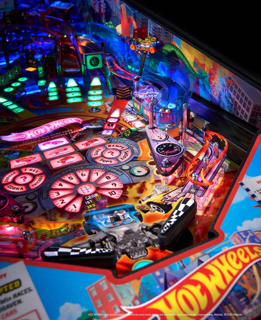 Some of the many RGB-lit inserts on the playfield