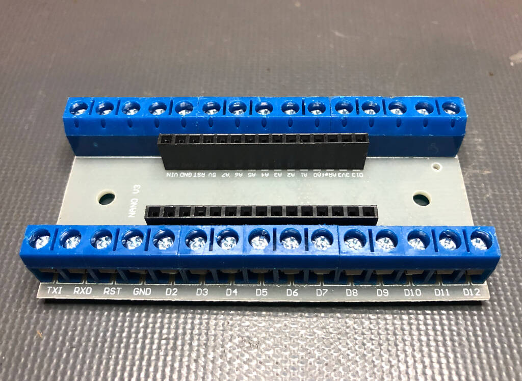 A breakout shield to bring the pin header connections onto screw terminals