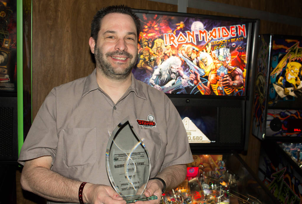 Mike Vinikour accepts the Pinball News Game of the Year award for Iron Maiden