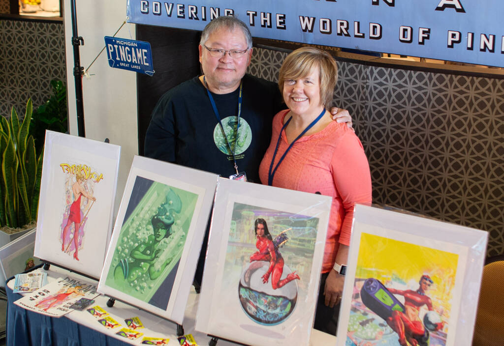Stan and Tracy surrounded by examples of Stan's work