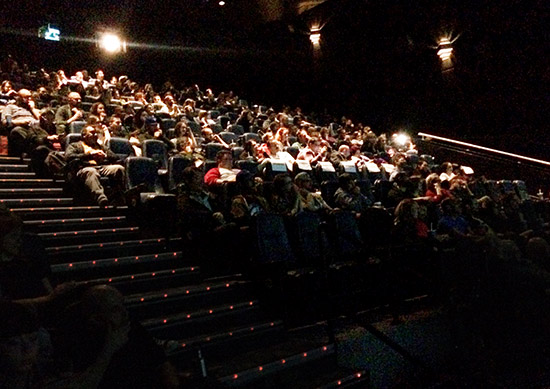 The audience watching the film