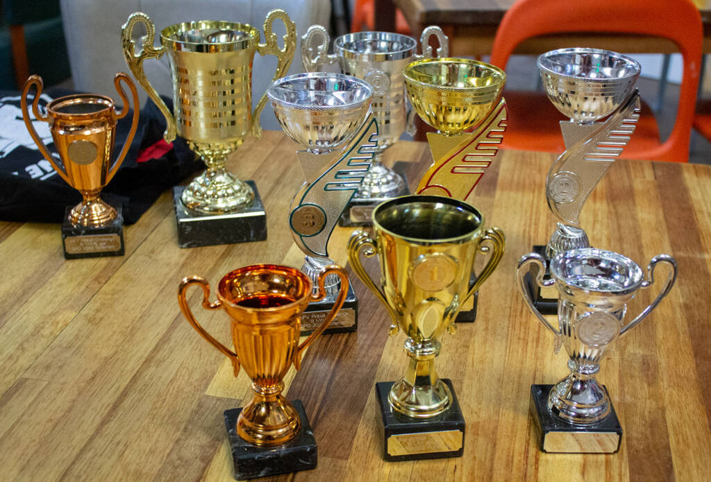 The trophies for the three divisions