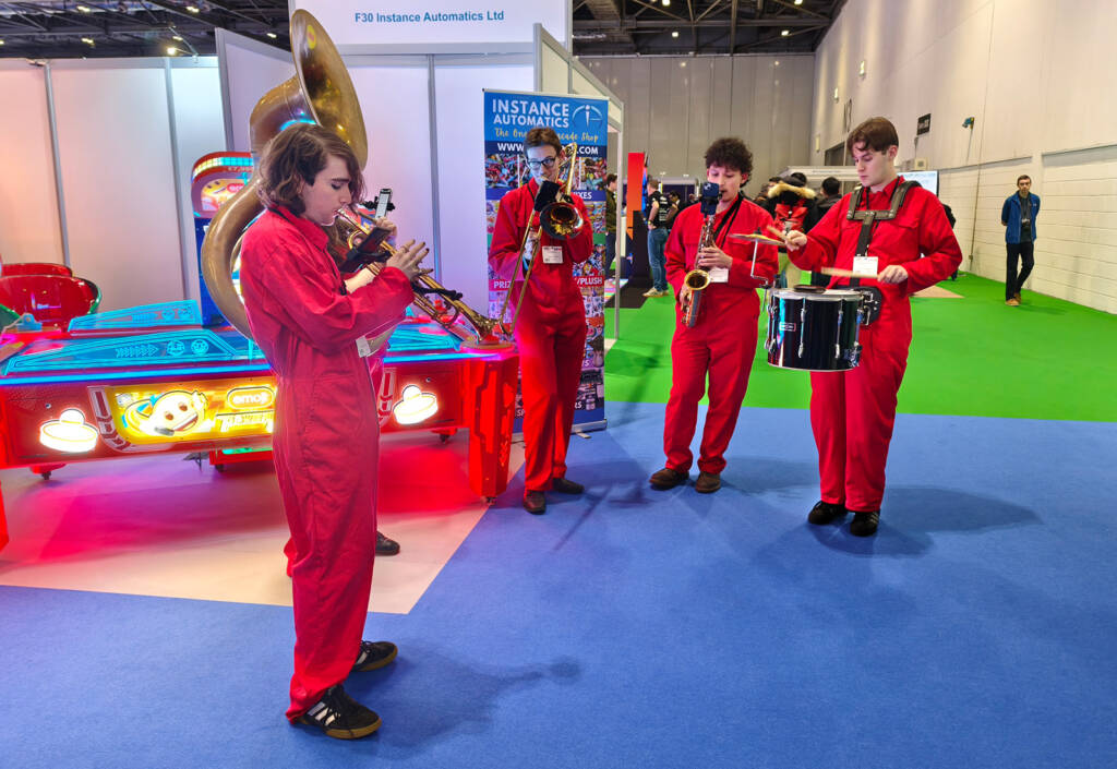The jazz quintet roamed the halls entertaining show guests