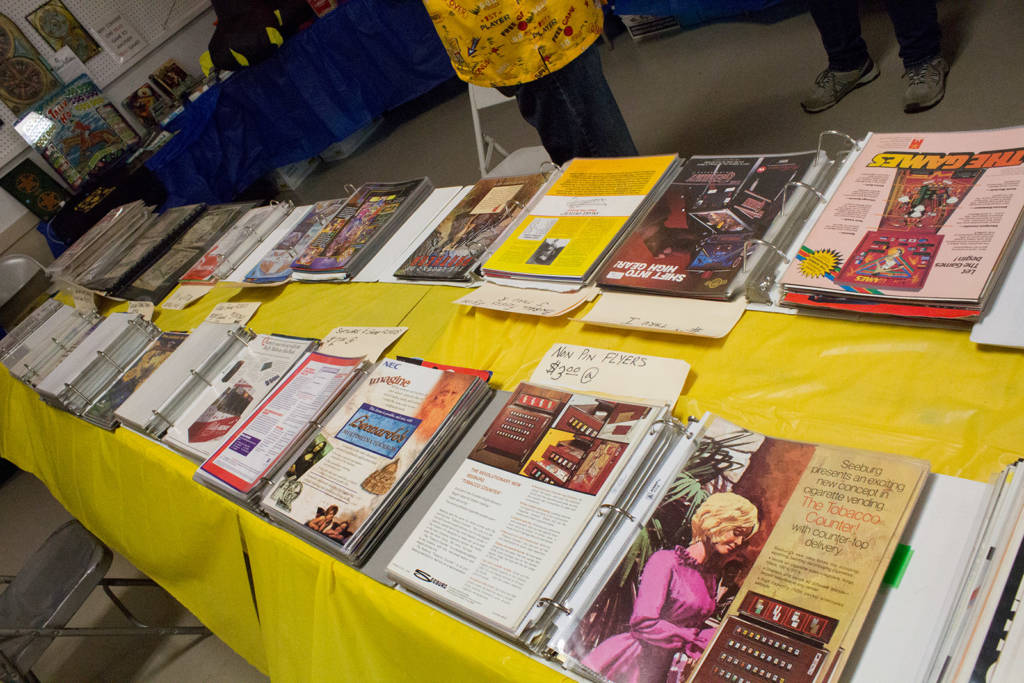 Lots of flyers, manuals and game schematics were available to buy