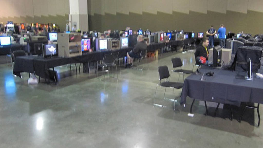 Long row of tables with classic home video games