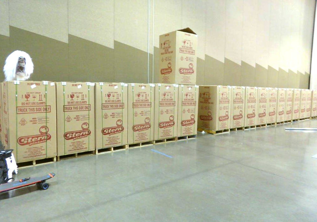 A long row of new-in-box Stern games during show set-up