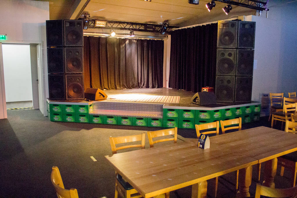 It also has a stage for announcements, performances and even karaoke