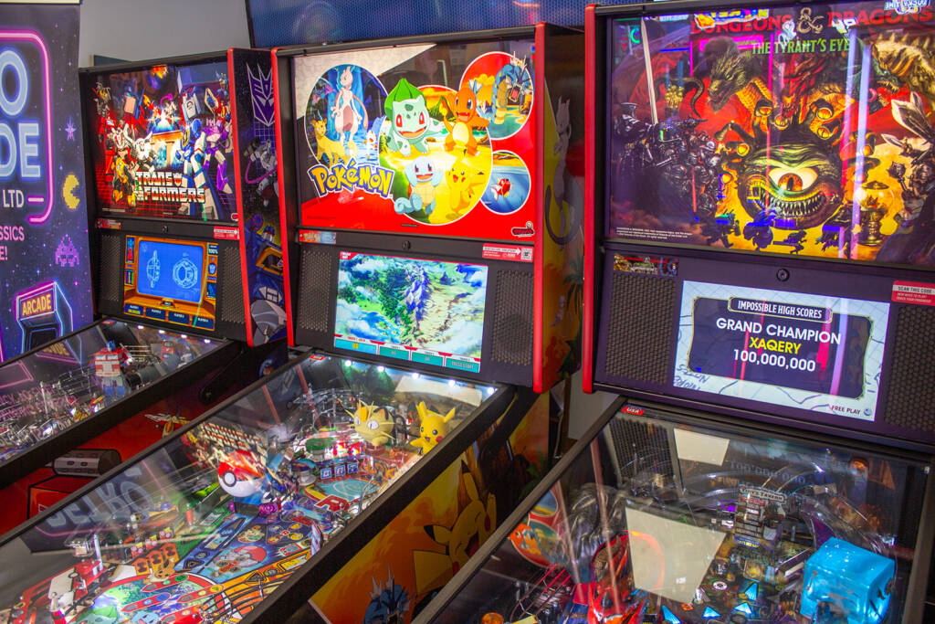The three Stern Pinball machines set up to play