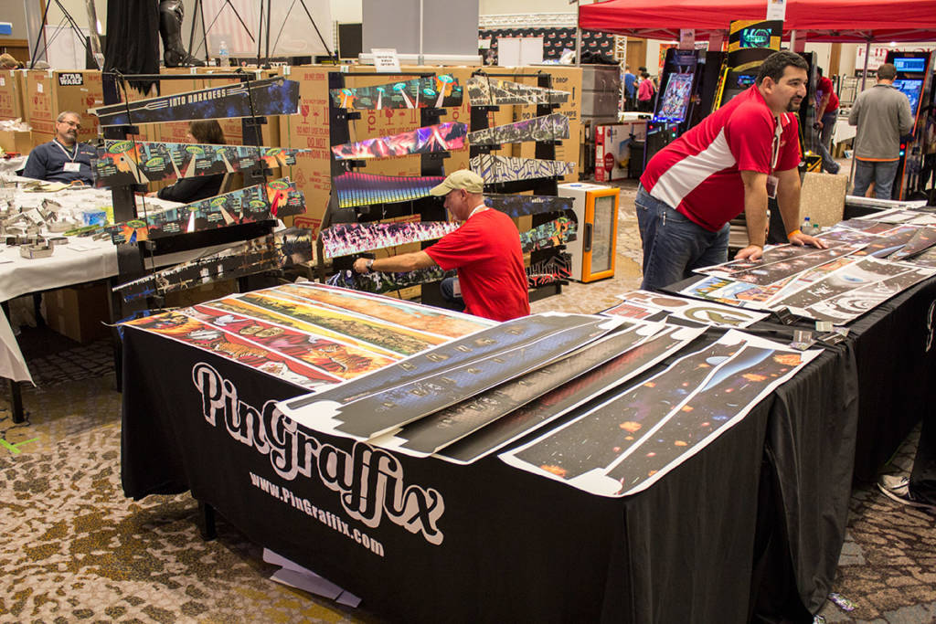 At the end of the row, Pin Graffix had their selection of colourful pinball interior artwork blades