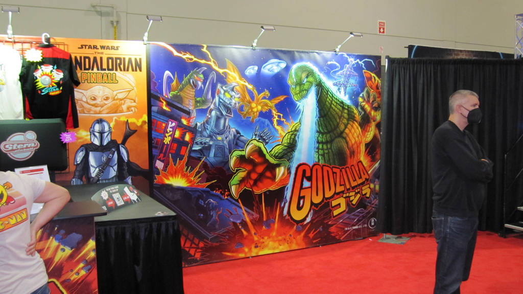 A large banner of the Godzilla Pro translite on the Stern Pinball stand