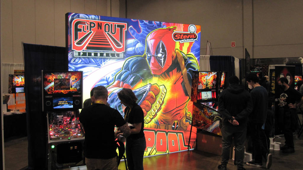 Another large poster, this time for Deadpool on the Flip N Out Pinball stand