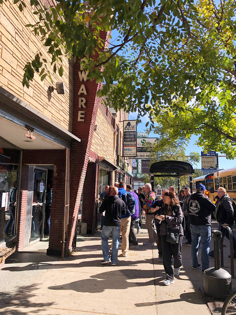 Tour guests arriving at Logan Arcade