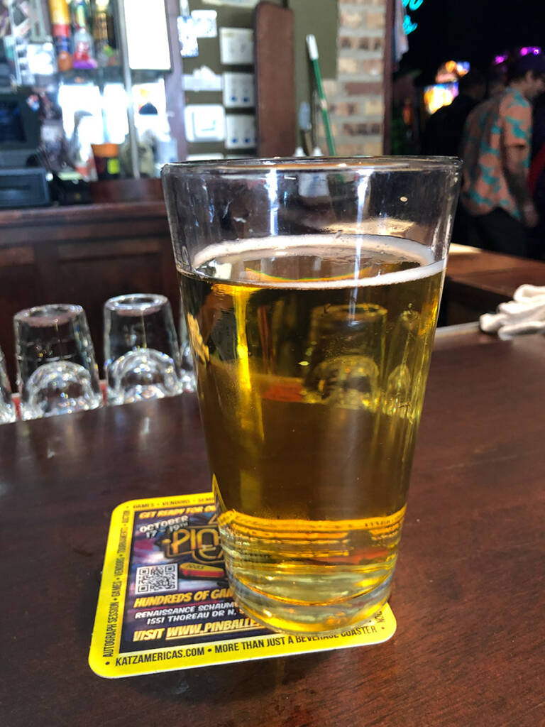 A Pinball Expo beer mat with your drink
